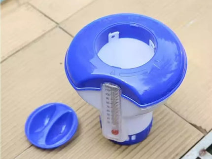 Pool float with chlorine dispenser and thermometer