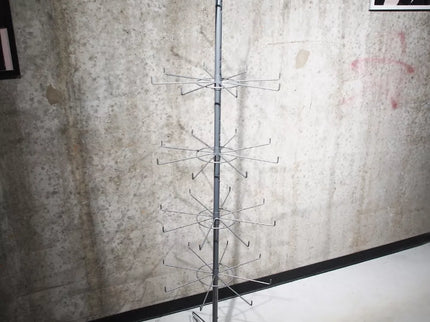 Besisukantis prekių stovas